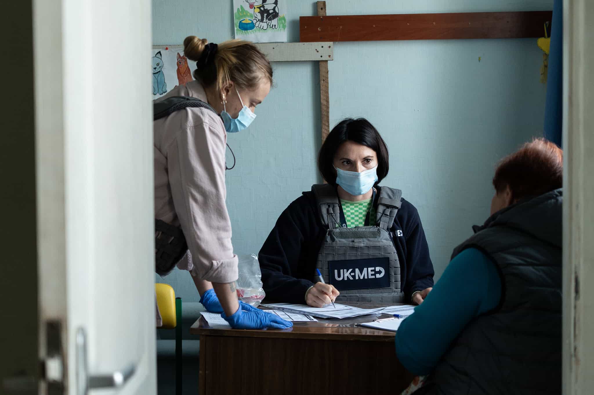 18f4f918-9ded-4e70-84de-b6b182bf7482 Dr Olena and Nurse Kateryna during a patient consultation in Hroza, a small village near the frontline. Despite the danger, UK-Med staff still visit these frontline communities to provide essential, lifesaving healthcare.